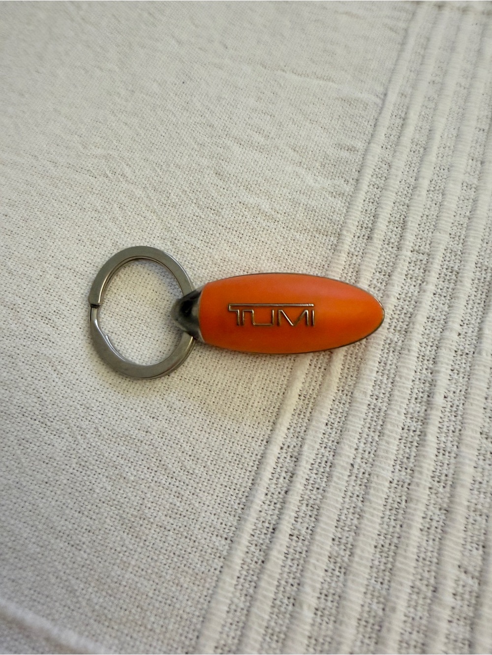 Tumi Orange Oval Logo Key Fob with Metal Ring - Picture 3 of 5